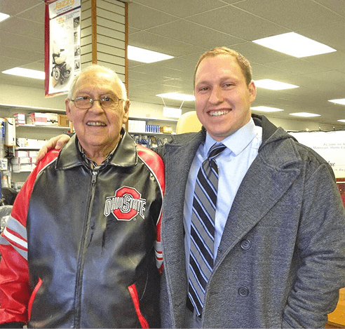 Two generations of the family inside a Med Mart retail store